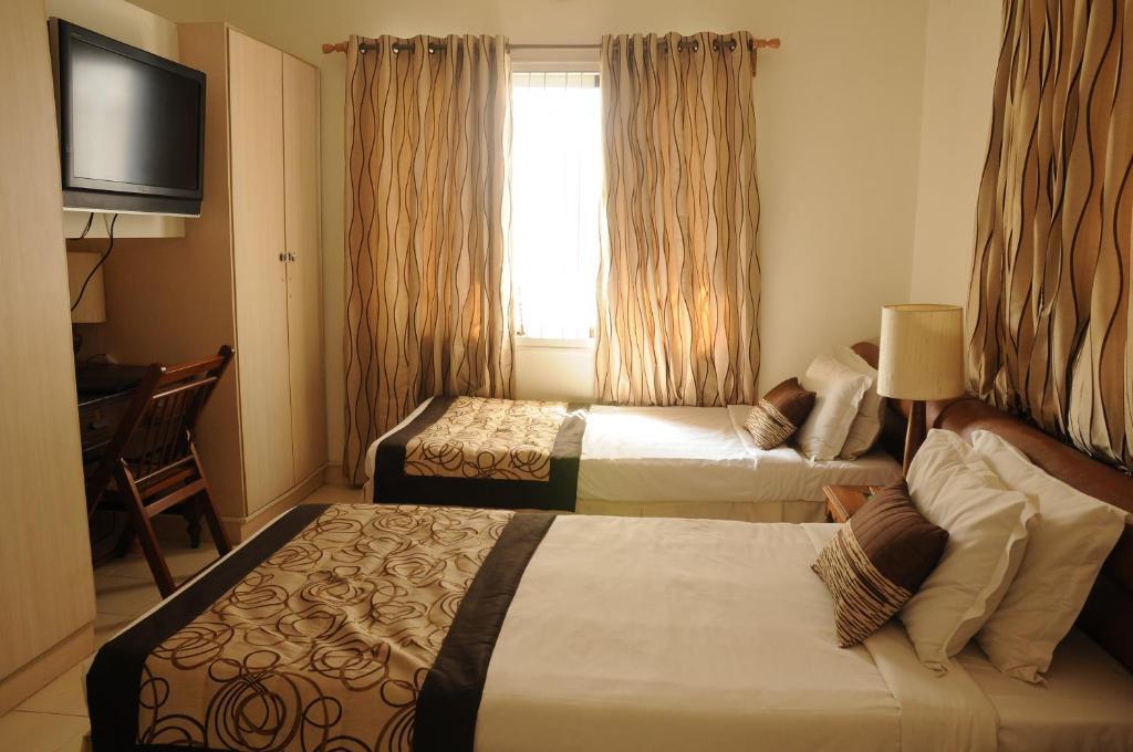 Executive Comfort Alwarpet Čennai Pokoj fotografie